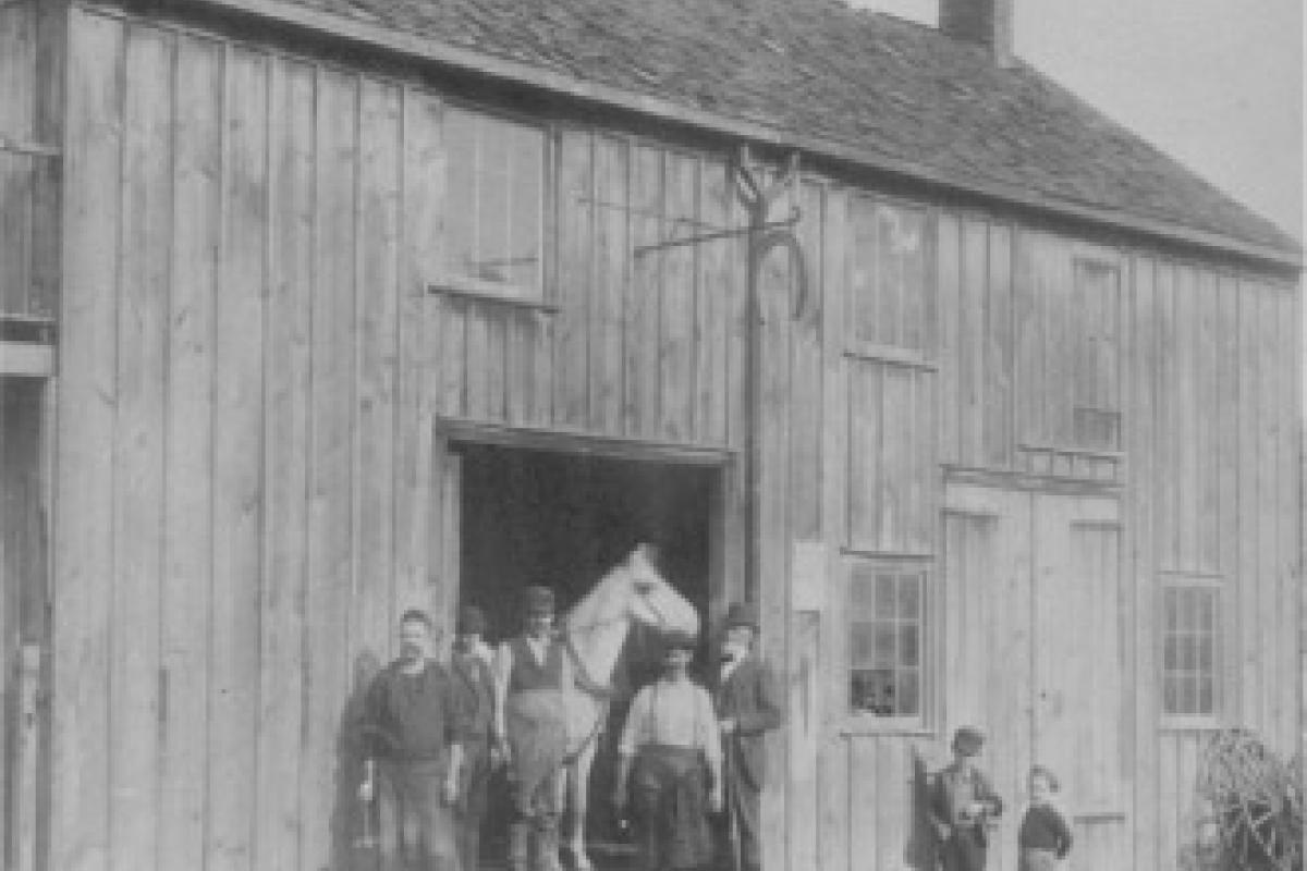 Here is a blacksmith shop from Oakland's horse and buggy days before the turn of the 20th Century. Blacksmiths not only fit horses with shoes but they also made household utensils, iron gates, hinges, etc. The boys on the left are Harry Gale McNomee and Ernest Lloyd McNomee. Harry would grow up to be one of Oakland's leading citizens.